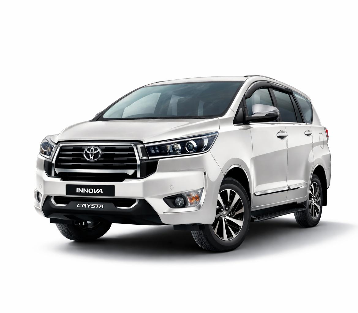 White Toyota Innova Crysta shown from the front three-quarter angle