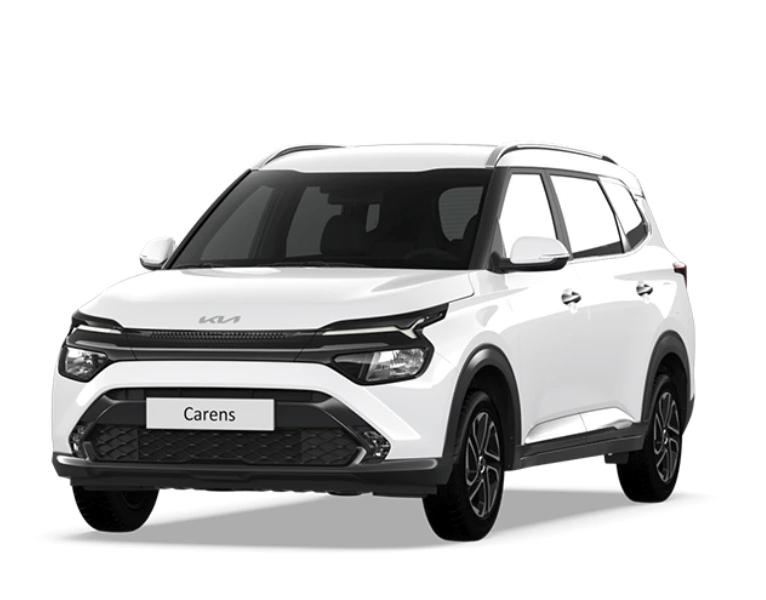 White Kia Carens shown from the front three-quarter angle